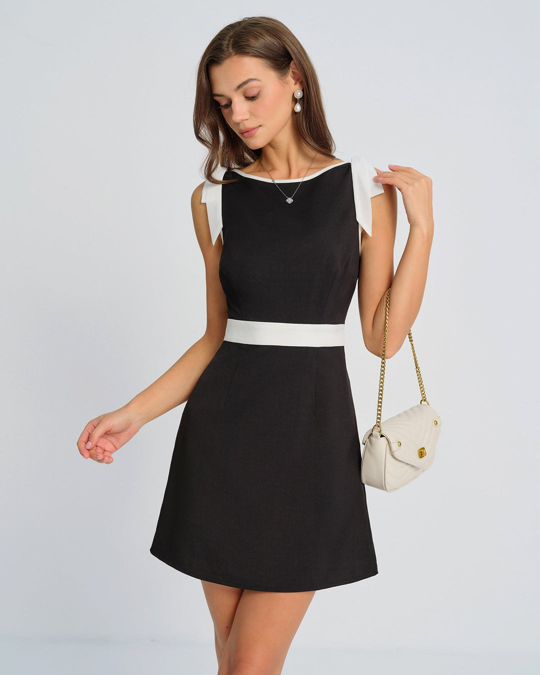 Morgan and Brooke | Black Mini Dress with Contrasting Bowknot