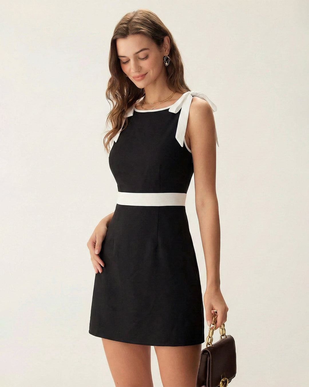 Morgan and Brooke | Black Mini Dress with Contrasting Bowknot