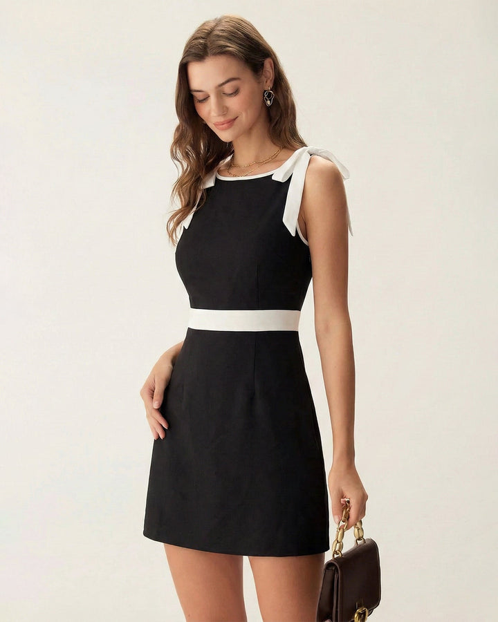 Morgan and Brooke | Black Mini Dress with Contrasting Bowknot